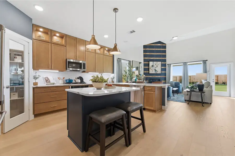 Furnished interior in a model home at Wildrye in Waller (Image 25).