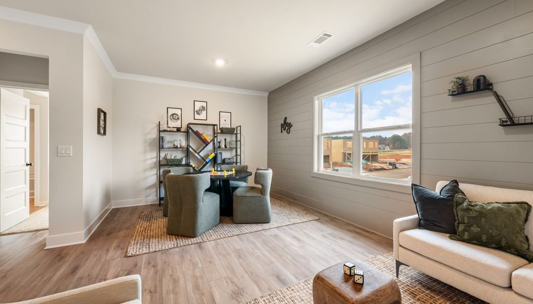 Furnished interior in a model home at Pinecrest Ridge in Dacula (Image 44).