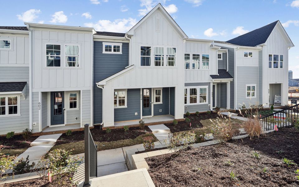 Front exterior of a home in the Mews at Holding Village community, located in Wake Forest, NC (Image 8).