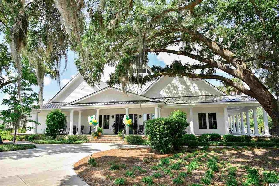 Front exterior of a home in the South Island Plantation community, located in Georgetown, SC (Image 1).