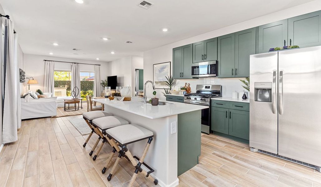 Furnished interior in a model home at Coronet at Gladden Farms in Marana (Image 9).