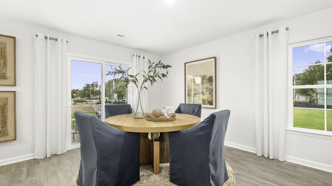 Furnished interior in a model home at Willow Mill in Thomasville (Image 6).