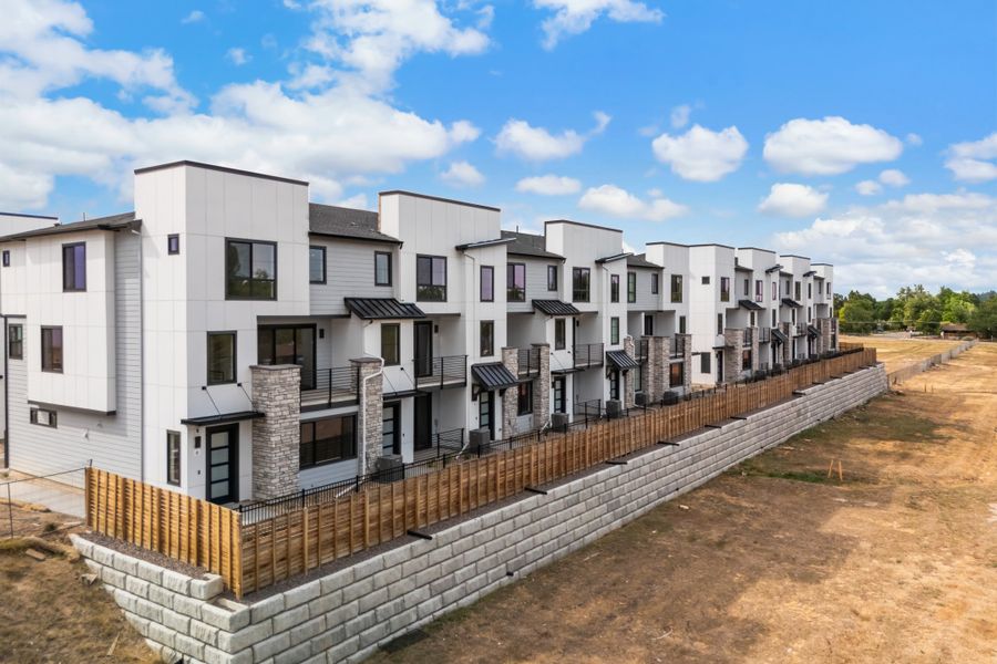 Front exterior of a home in the The Hub at Virginia Village community, located in Denver, CO (Image 1).