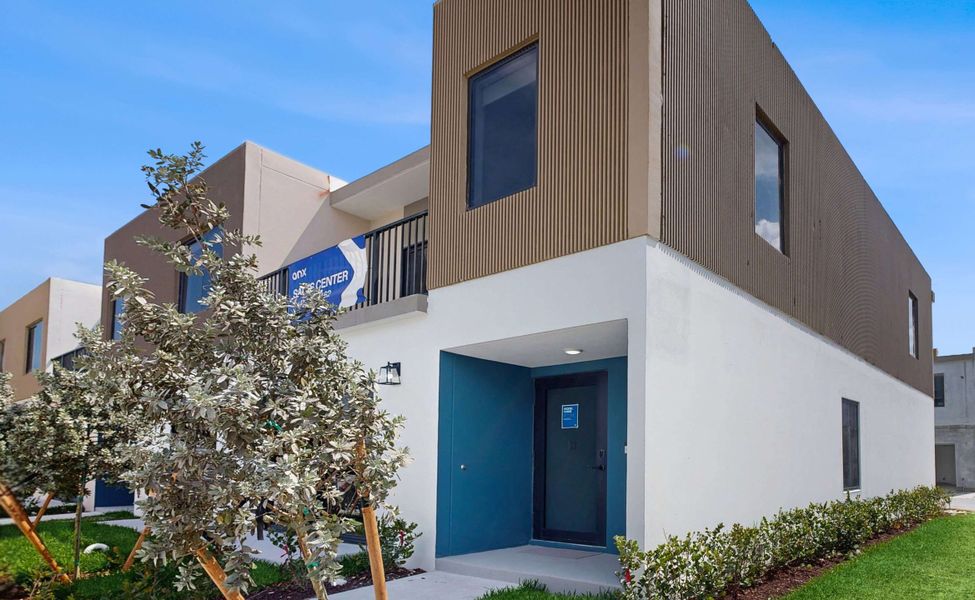 Front exterior of a home in the On Grandville community, located in Homestead, FL (Image 4). Front exterior of a home in the On Grandville community, located in Homestead, FL (Image 4).