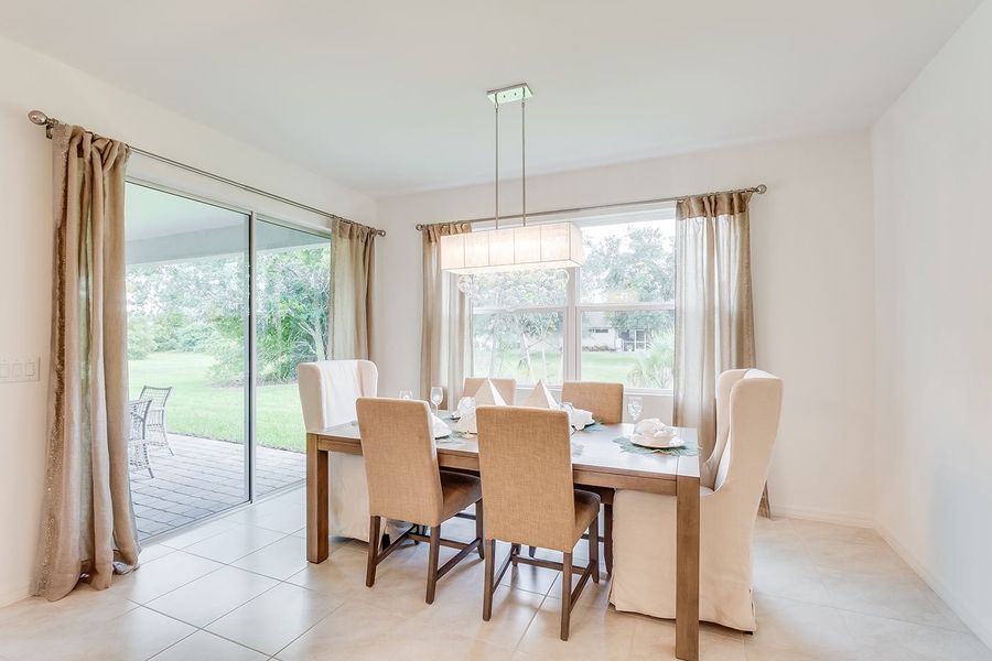 Furnished interior in a model home at Deep Creek Tradition Series in Punta Gorda (Image 10).