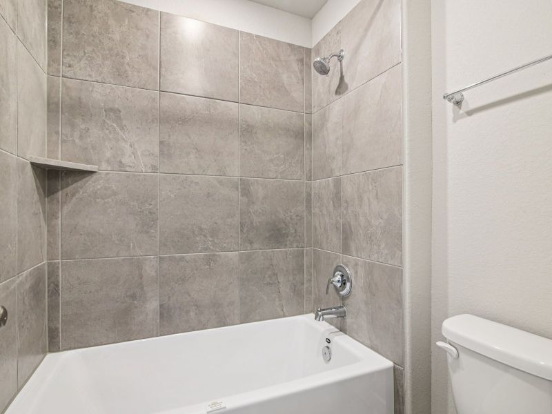 Furnished interior in a model home at Massey Oaks - Estate Series in Pearland (Image 17).