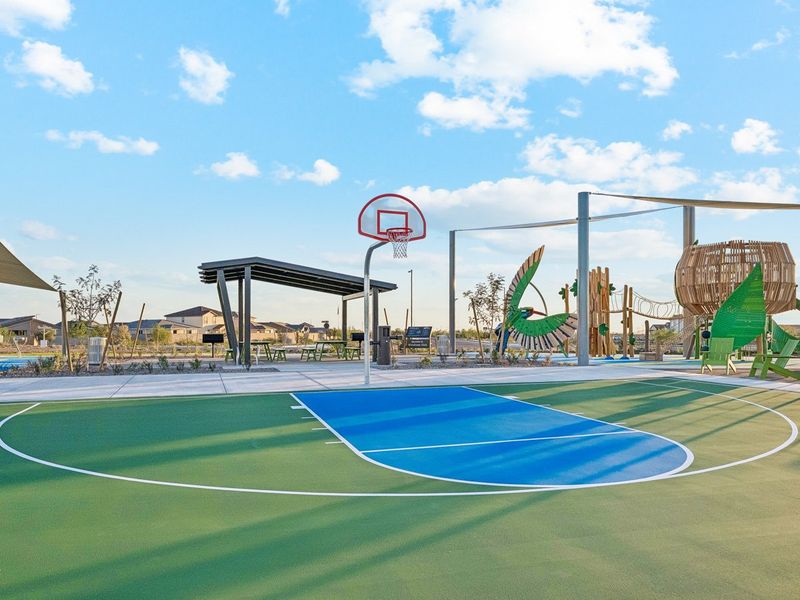 A basketball court with a basketball hoop. A basketball court with a basketball hoop.