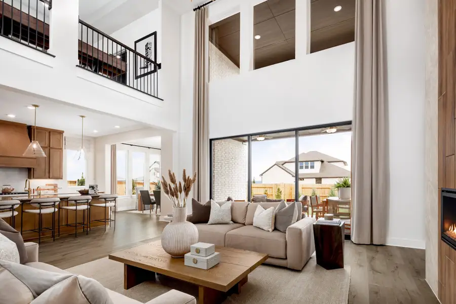 Furnished interior in a model home at 6 Creeks in Kyle (Image 28).
