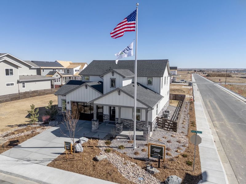 Front exterior of a home in the Barefoot Lakes community, located in Firestone, CO (Image 4). Front exterior of a home in the Barefoot Lakes community, located in Firestone, CO (Image 4).