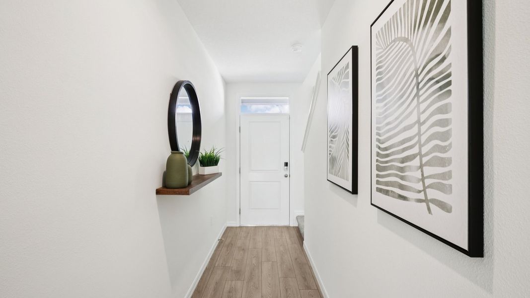 Furnished interior in a model home at Towns at Woodsdale in Wesley Chapel (Image 7).