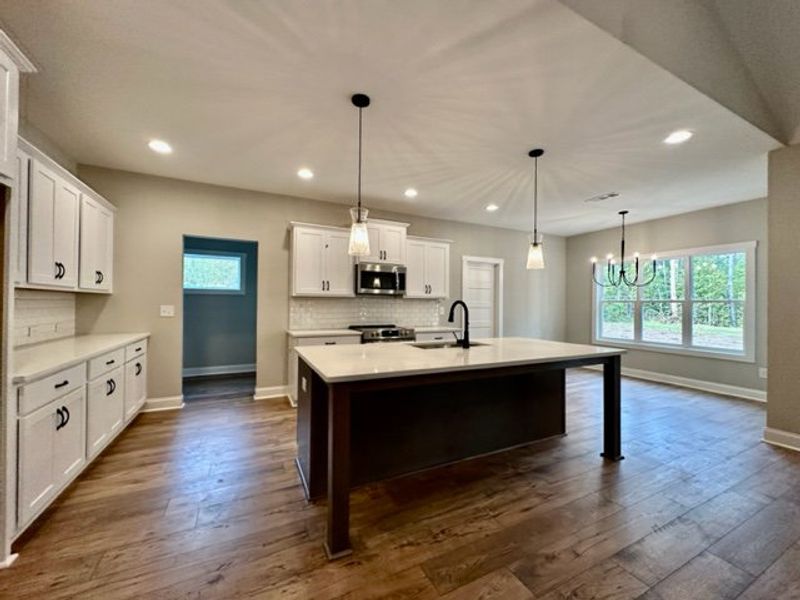 Furnished interior in a model home at Polk Place in Moreland (Image 11).