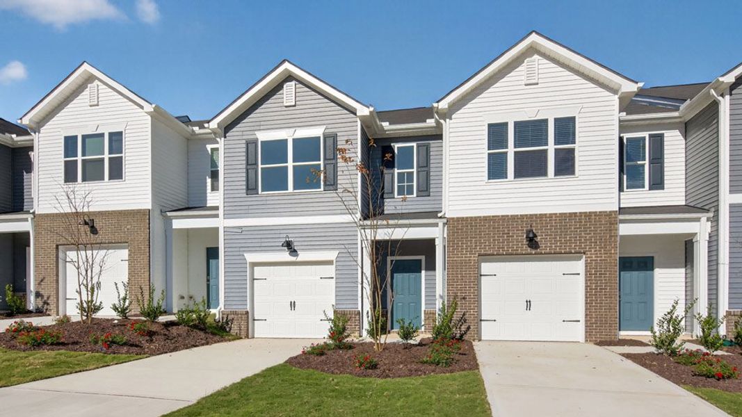 Front exterior of a home in the The Townes at Galvins Ridge community, located in Sanford, NC (Image 2).