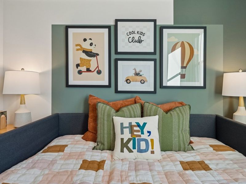 A bed with a pillow and pillows. A bed with a pillow and pillows.