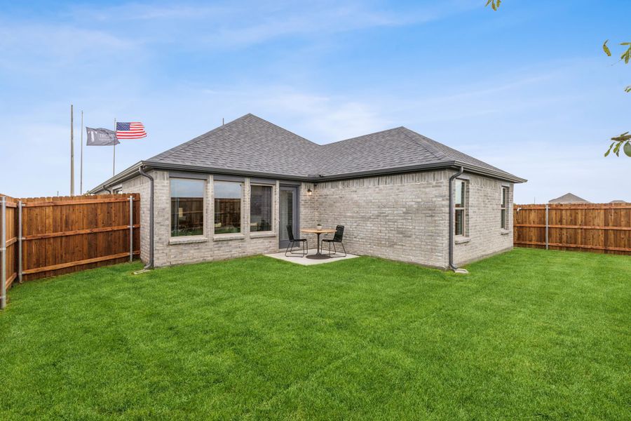 Covered Patio in a Stonehaven new Turquoise home in Seagoville TX by Trophy Signature Homes – REPRESENTATIVE PHOTO