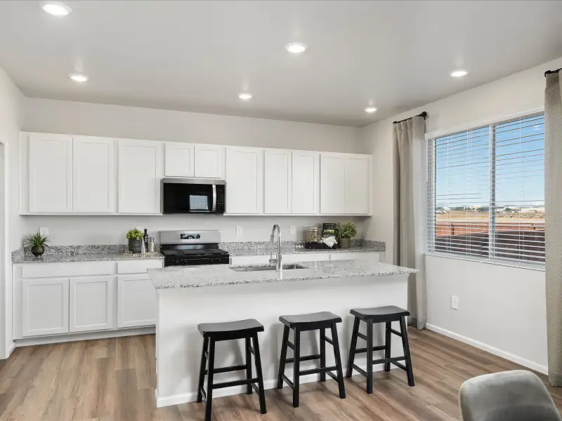 Furnished interior in a model home at Frontier Estates - The Flora Collection in Firestone (Image 4).