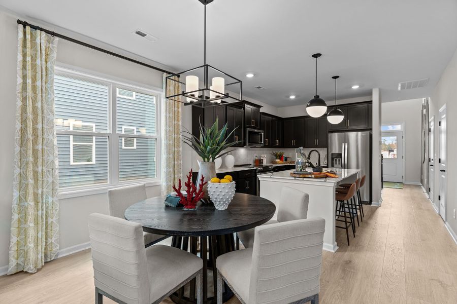 Furnished interior in a model home at Coastal Haven in Leland (Image 7).