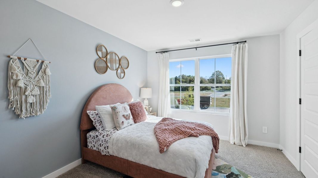 Furnished interior in a model home at Harvest Point in Spring Hill (Image 29).