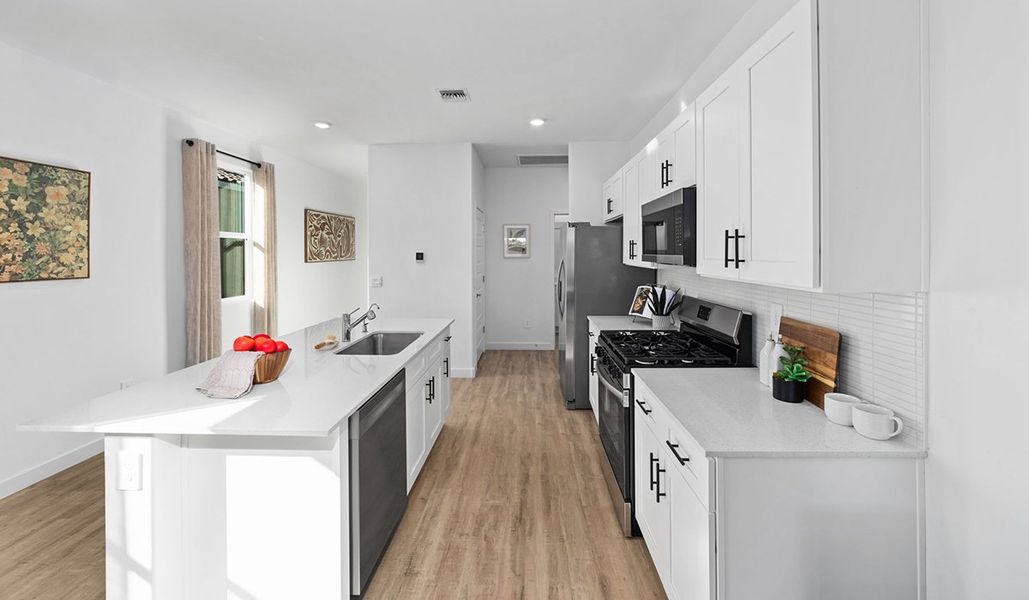 Furnished interior in a model home at Entrada Del Toro at Rancho Sahuarita in Sahuarita (Image 8).