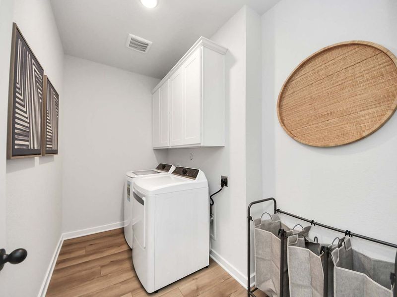 Furnished interior in a model home at Enclave at Newport in Crosby (Image 15).