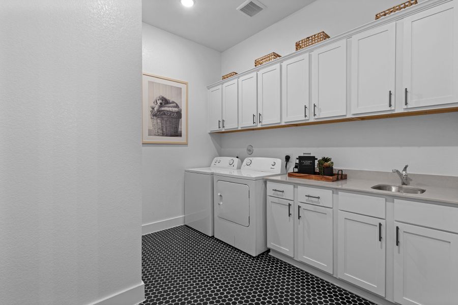 Furnished interior in a model home at Hunters Crossing in Sealy (Image 28).