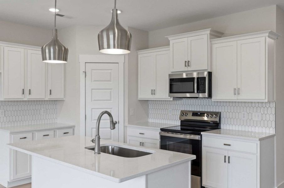 Furnished interior in a model home at The Paddock in Gallatin (Image 8).