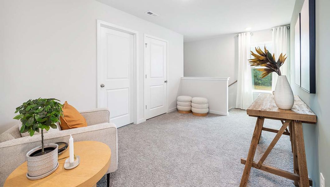 Furnished interior in a model home at Cardinal Creek in Charlotte (Image 35).