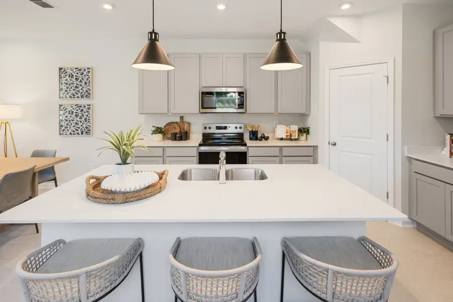 Furnished interior in a model home at Egret Creek in Jacksonville (Image 7).