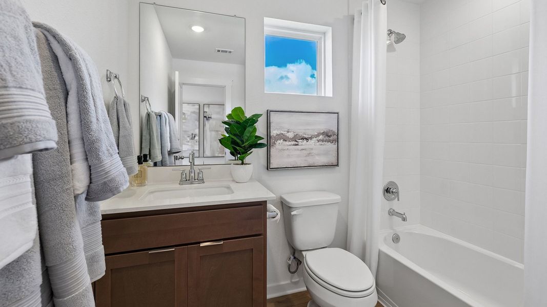 Furnished interior in a model home at Monarch Ranch in Manor (Image 36).