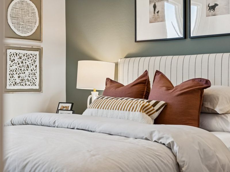 A bed with pillows. A bed with pillows.