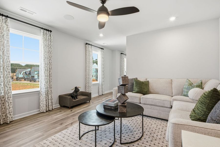 Furnished interior in a model home at Clairmont in Charlotte (Image 18).