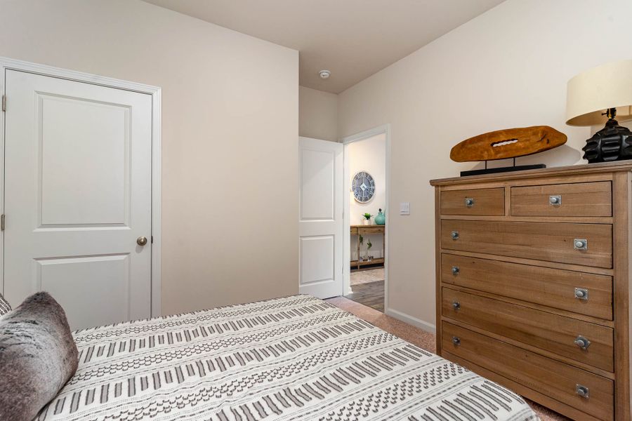 Furnished interior in a model home at Island Green in Myrtle Beach (Image 53).