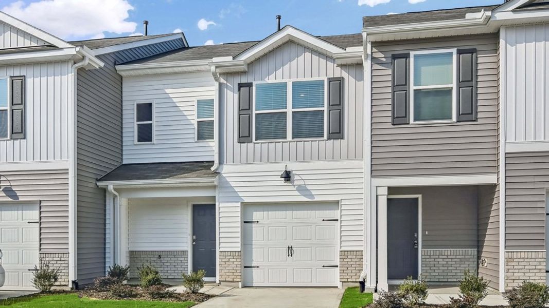 Front exterior of a home in the The Townes at Honeycutt Oaks community, located in Angier, NC (Image 13).