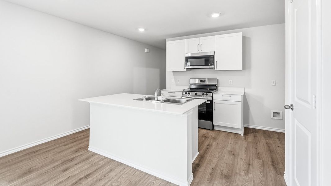 Furnished interior in a model home at Asher Oaks in Bonham (Image 4).
