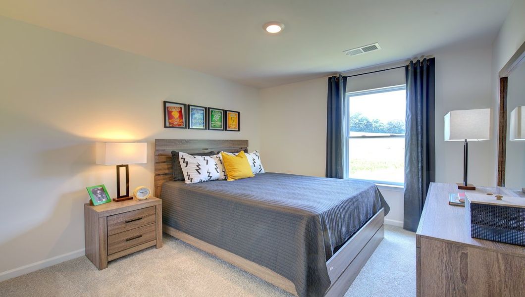Furnished interior in a model home at Patton Cove in Clyde (Image 11).