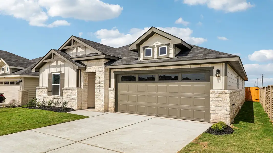 Front exterior of a home in the Monarch Ranch community, located in Manor, TX (Image 5).