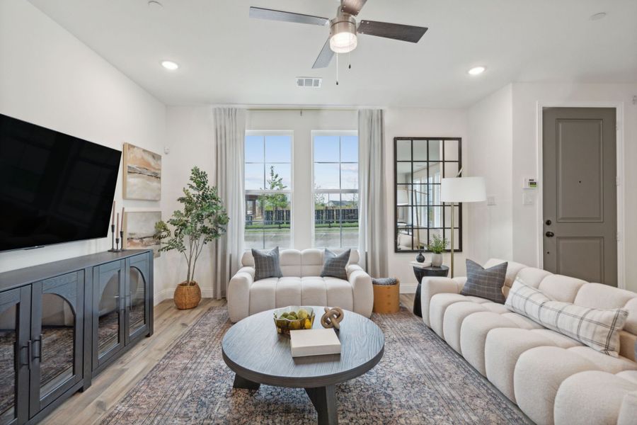 Furnished interior in a model home at Twin Creeks Watters in Allen (Image 8).
