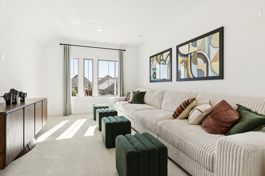 REPRESENTATIVE PHOTO – Media Room in the Winters model home in Aledo TX by Trophy Signature Homes