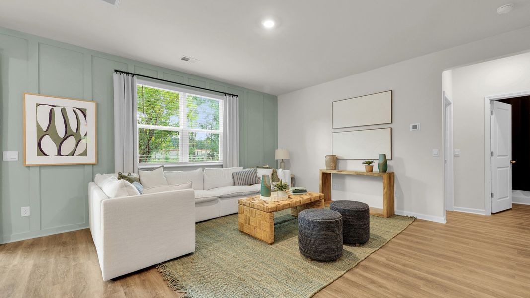 Furnished interior in a model home at The Cove at Mallard Crossing in Summerville (Image 9).