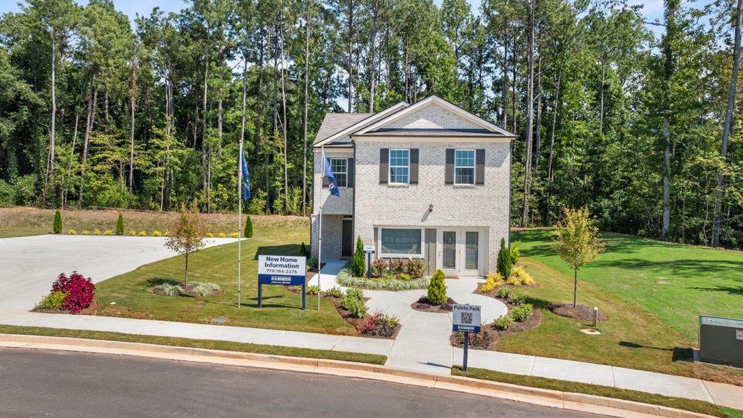 Front exterior of a home in the Pointe Park community, located in Union City, GA (Image 4). Front exterior of a home in the Pointe Park community, located in Union City, GA (Image 4).