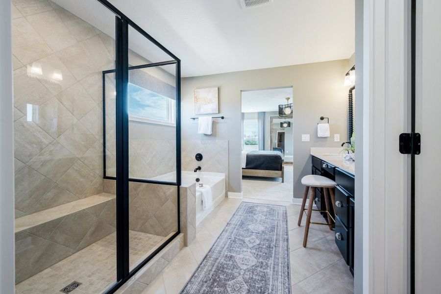 Furnished interior in a model home at Breakfast Point East in Panama City Beach (Image 59).