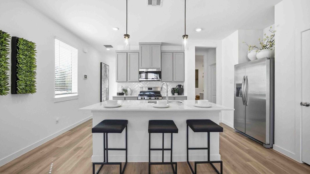 Furnished interior in a model home at Mansfield Park in Houston (Image 3).