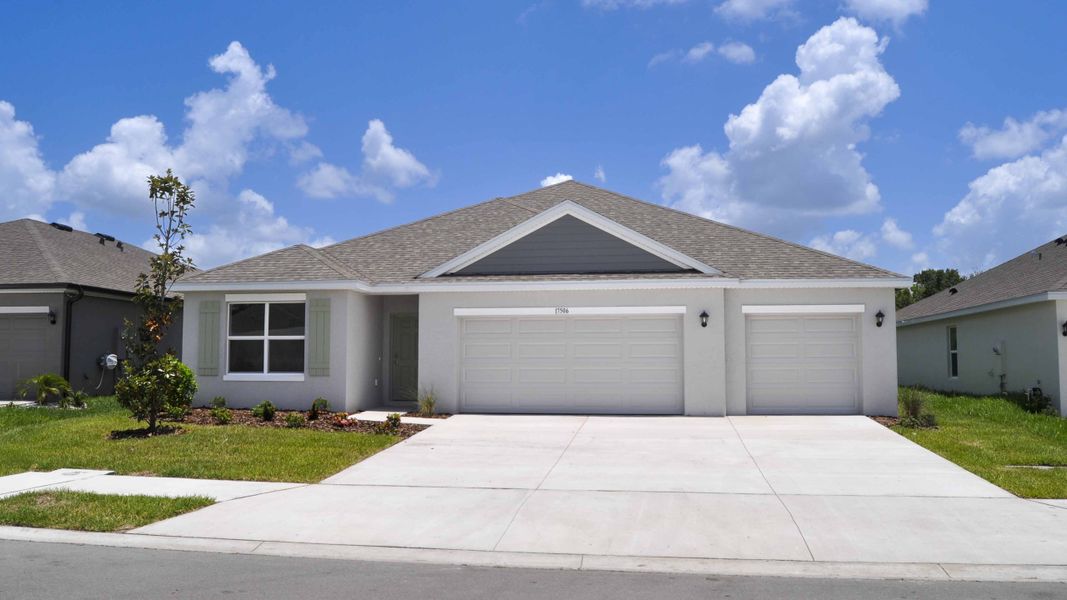 Front exterior of a home in the Oakfield Lakes community, located in Parrish, FL (Image 4).