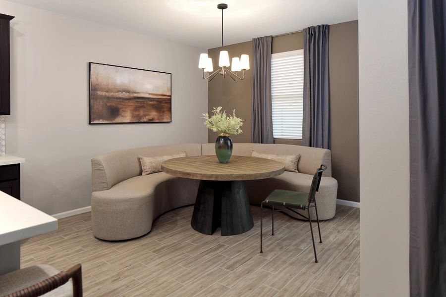 Furnished interior in a model home at Sanctuary at Stonebridge Manor in Waddell (Image 6).