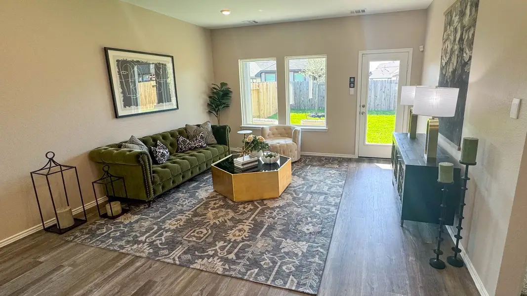 Furnished interior in a model home at Venetian Pines in Conroe (Image 9).