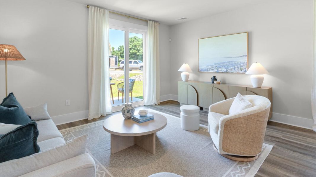 Furnished interior in a model home at Surfside Landing in Hubert (Image 12).