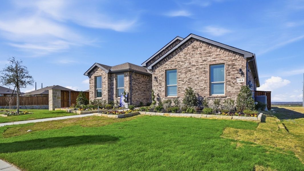 Front exterior of a home in the Bluestem community, located in Rhome, TX (Image 22). Front exterior of a home in the Bluestem community, located in Rhome, TX (Image 22).