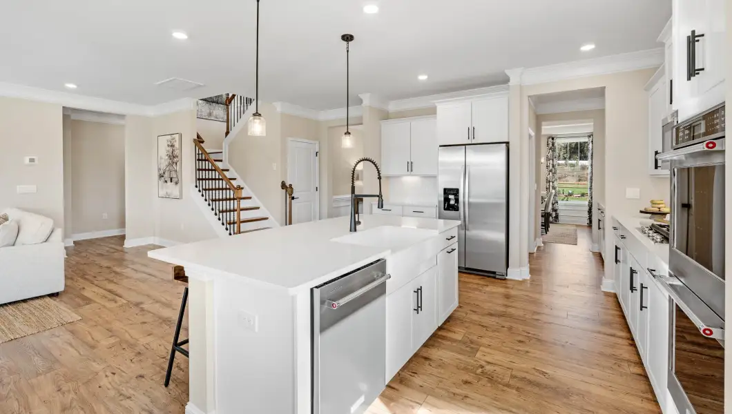 Furnished interior in a model home at North Highway 101 in Greer (Image 11).