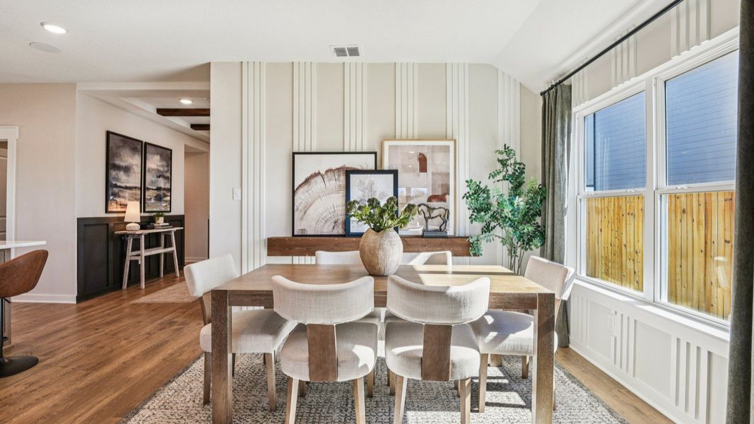 Casual dining area opens to the great room and has plenty of windows for natural light Casual dining area opens to the great room and has plenty of windows for natural light