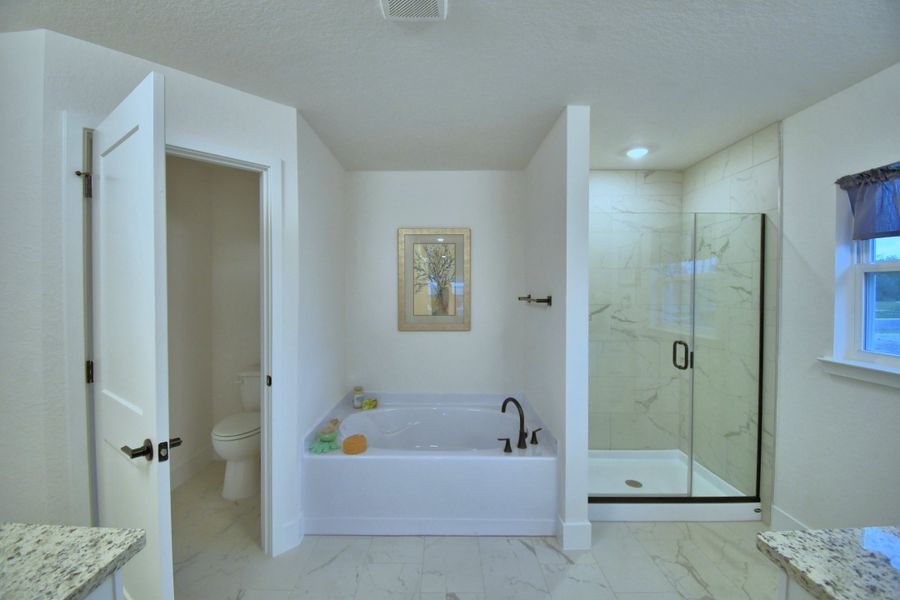 Furnished interior in a model home at The Reserve in Lakeland (Image 7).