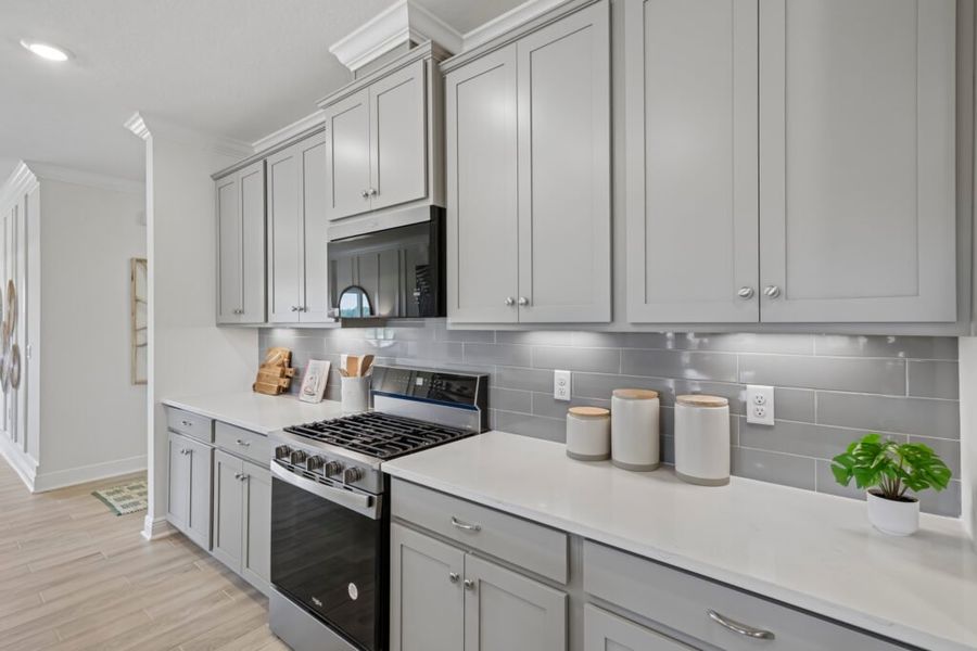 Furnished interior in a model home at Mahogany At Jubilee in Pace (Image 8).